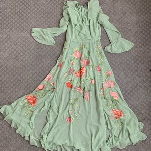 Sage green dress with floral embroidery